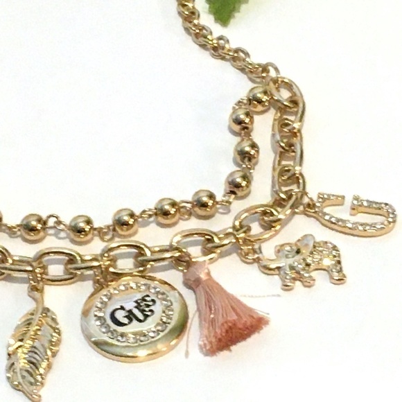 3/$29! GUESS charm necklace tassel, elephant, leaf - Picture 6 of 7